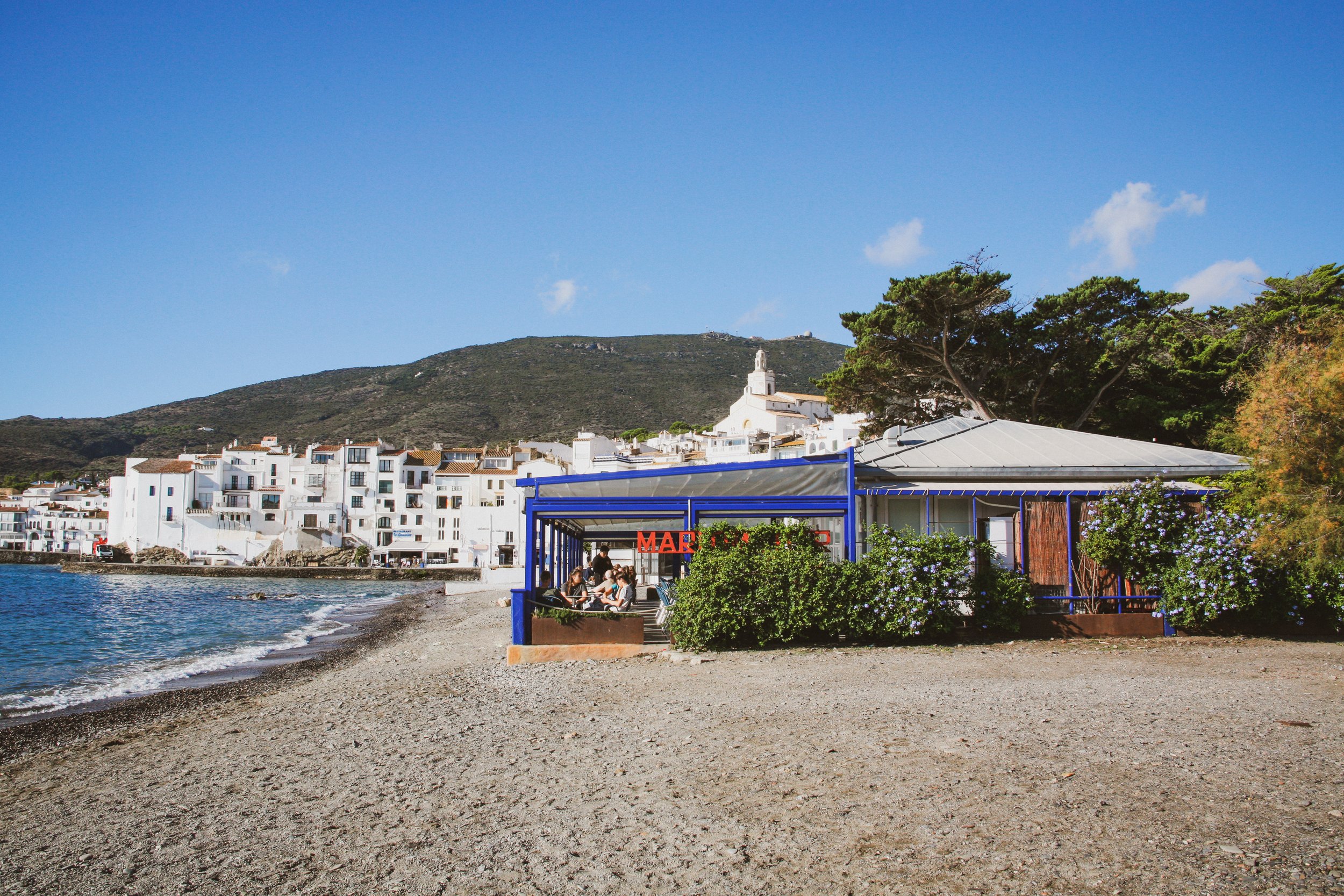 Shared landscape area on the beach of Cadaques, Cap de Creus respecting natural topography