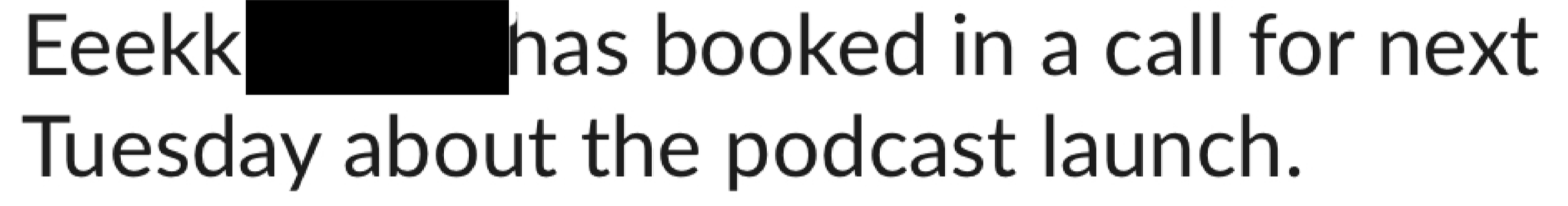 Text message about someone booking a call for a podcast launch, with part of the message blacked out.