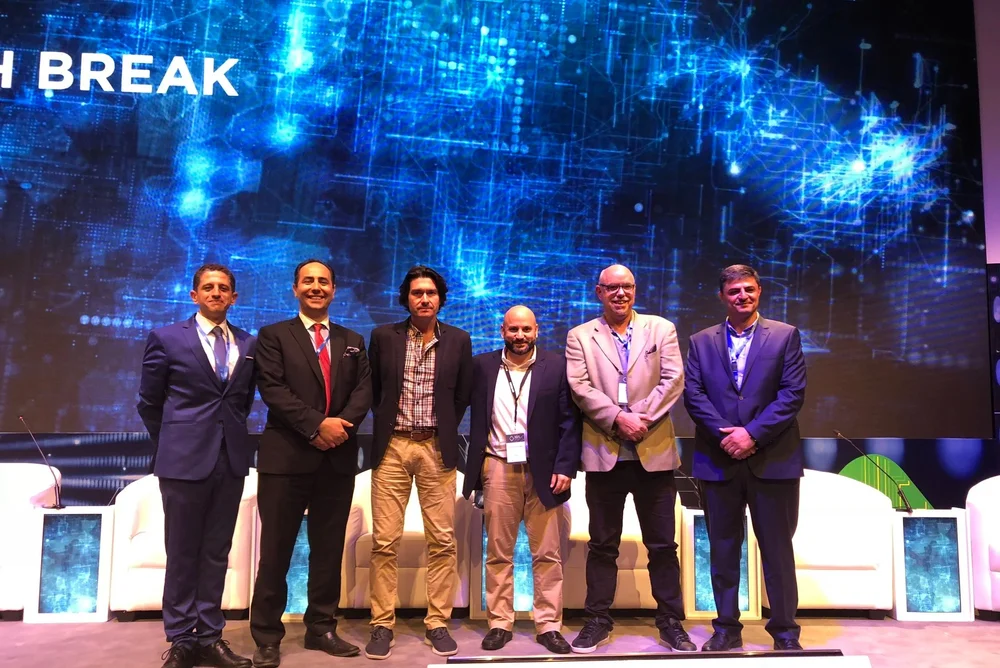 Business leaders participating in an international technology forum