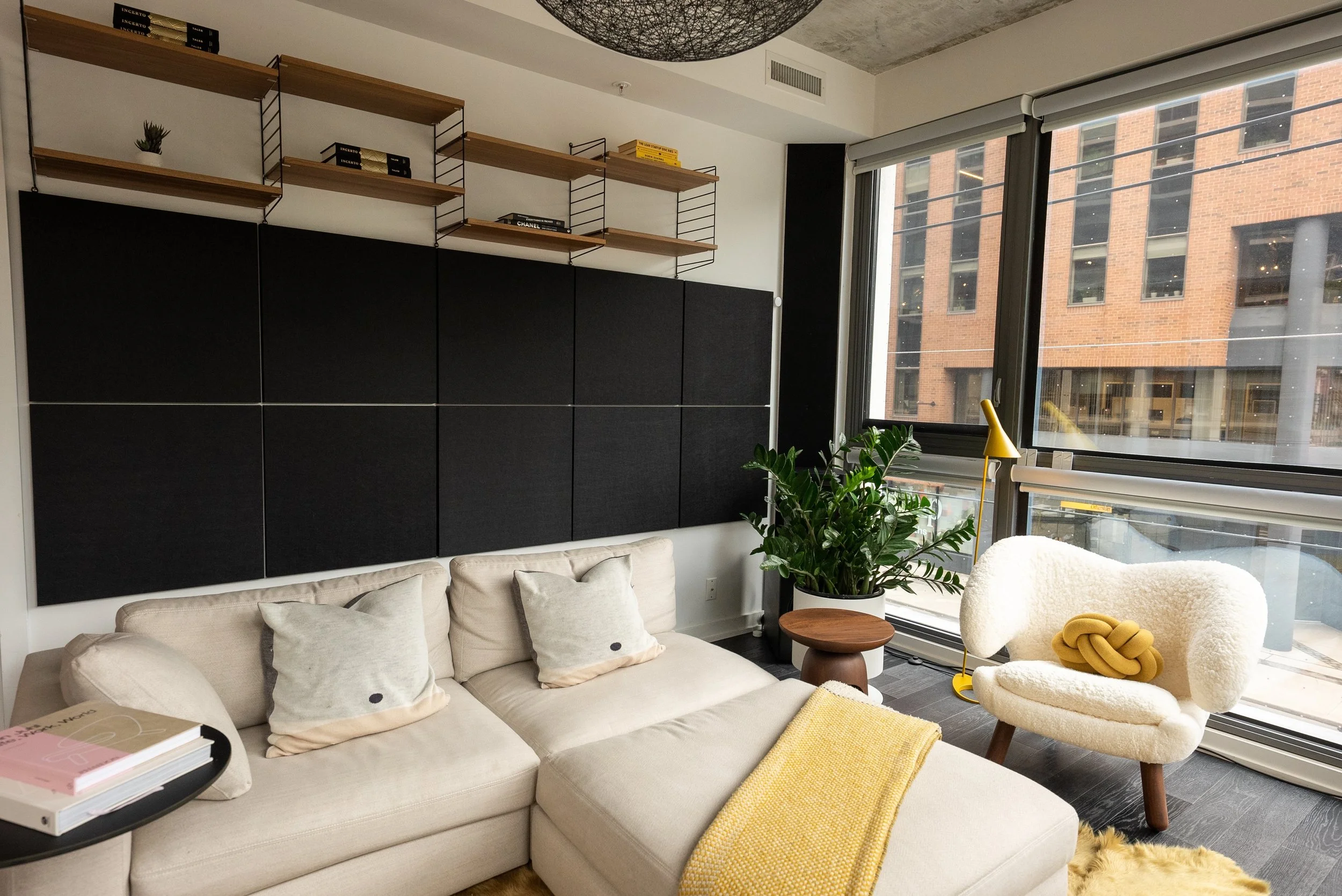 Behind the sofa, acoustic panels were used for both audio purposes for the entertainment centre but also to reduce noise from the living area to the bedroom.