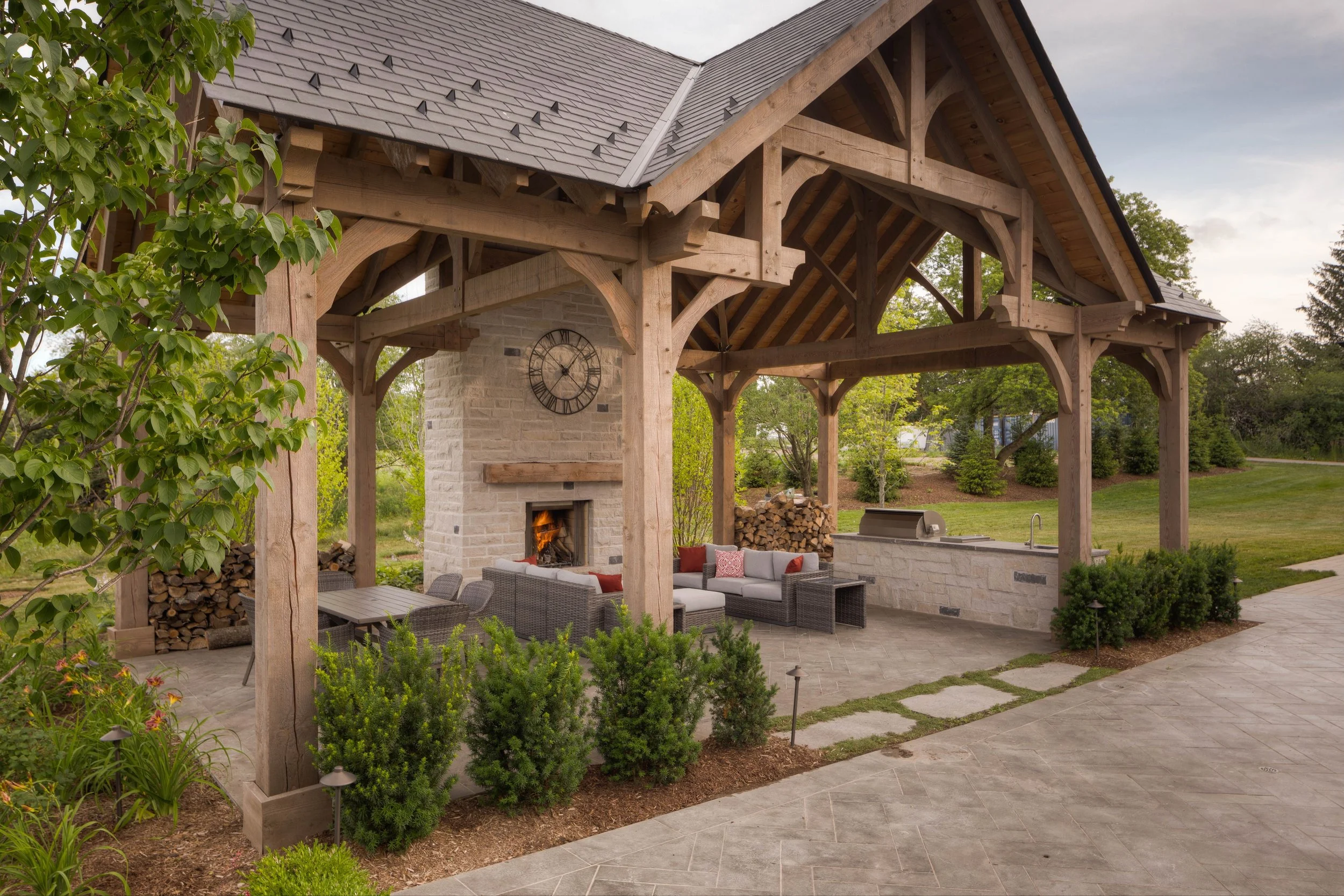 This massive outdoor pergola with the 26' tall wood burning fireplace is the perfect area to unwind after a busy day surrounded by nature. 