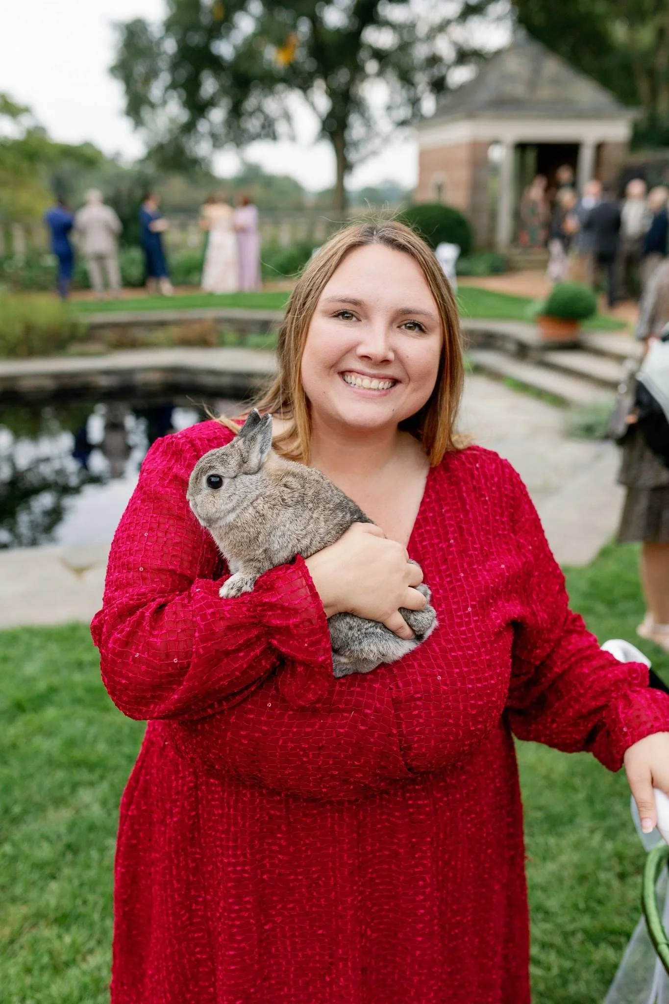 Professional pet wedding attendant caring for bunny at a wedding in Chicago. 