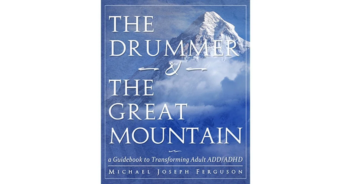 Book cover titled "The Drummer & The Great Mountain" by Michael Joseph Ferguson, featuring a snowy mountain peak and cloud background.