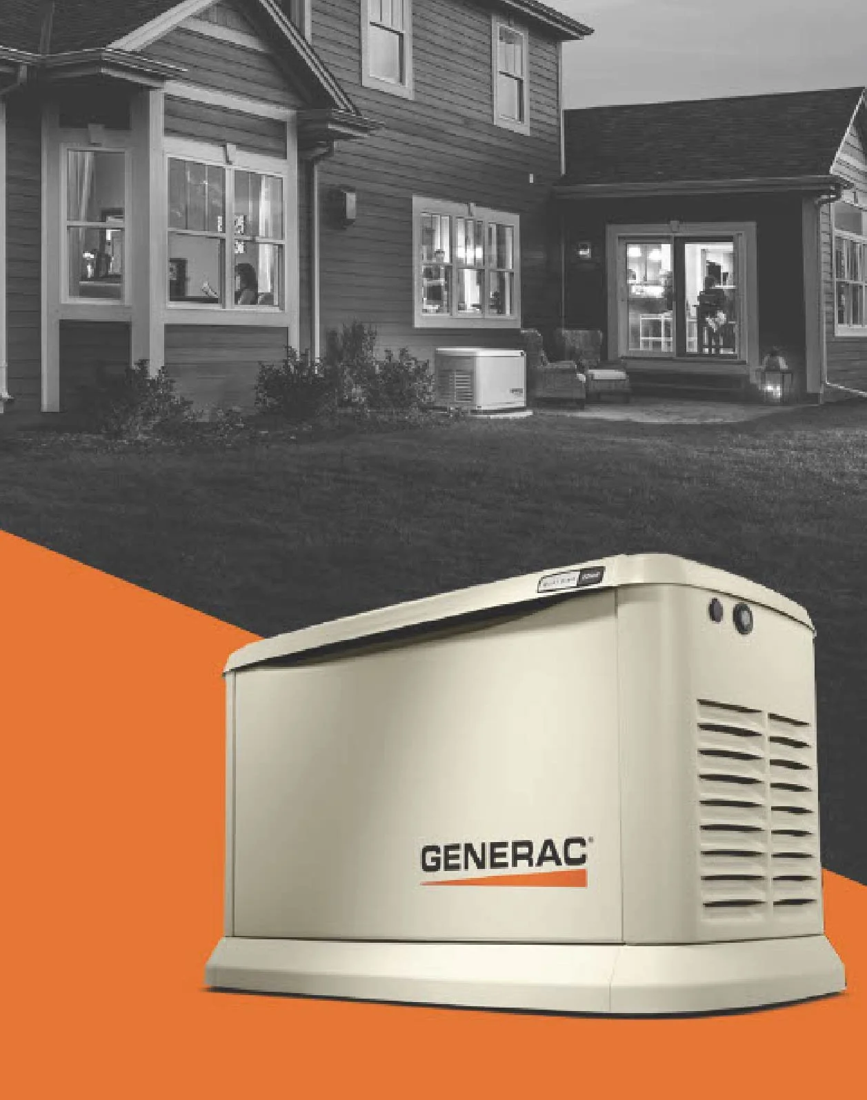 A Generac generator in the foreground with a house in the background. The house is a two-story home with multiple windows, a porch, and outdoor furniture visible through the windows. The setting is outdoors, and the image appears to be taken during dusk or night.