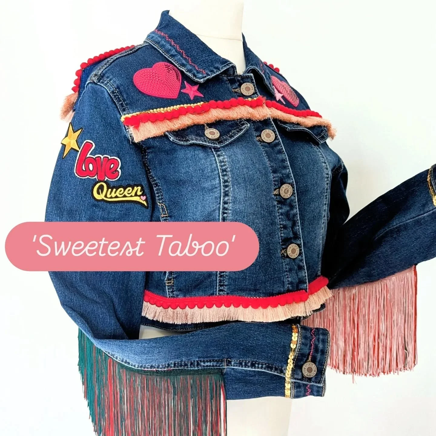 ✨ New drop: Sweetest Taboo ✨
&ldquo;There&rsquo;s a quiet storm&hellip;&rdquo; and she just landed.

A cropped, custom denim dream in pinks, reds and golds &mdash; finished with cherry-sweet sequins, UV thread, and that signature swing of tassels.
Ma