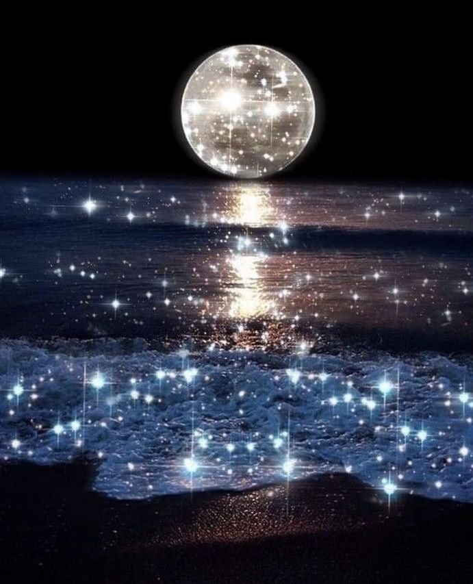 A sparkling, digitally enhanced night scene of a beach with a glowing, starry moon reflected on the water, surrounded by numerous tiny stars and light reflections.