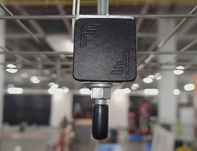 Black safety deep end cap used for sharp edge protection on metal strut channels.