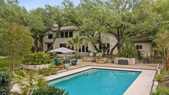 This is the kind of home that rarely comes to market. 

Welcome to The Sprucewood Sanctuary &mdash; a private half-acre retreat steps from Bull Creek. 

Imagine mornings that start with coffee on the patio, surrounded by nothing but mature trees and 