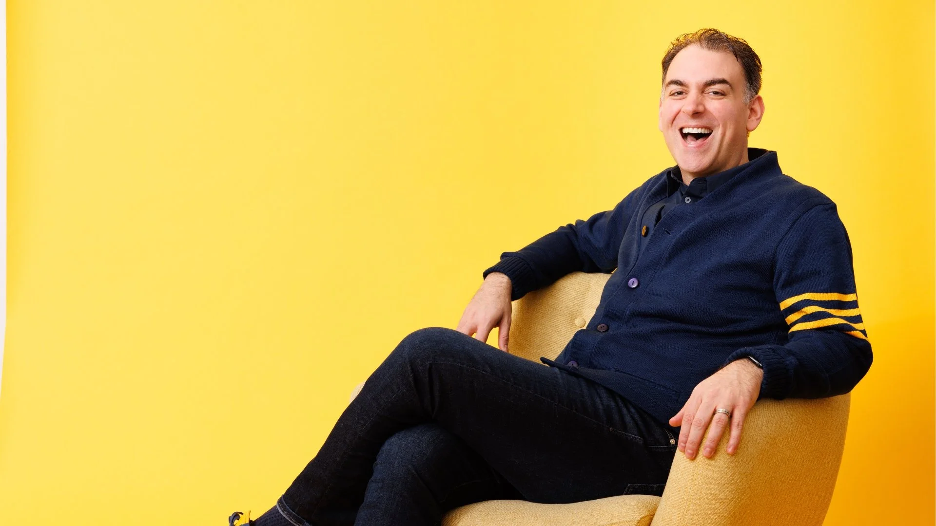 Photo sitting in chair.