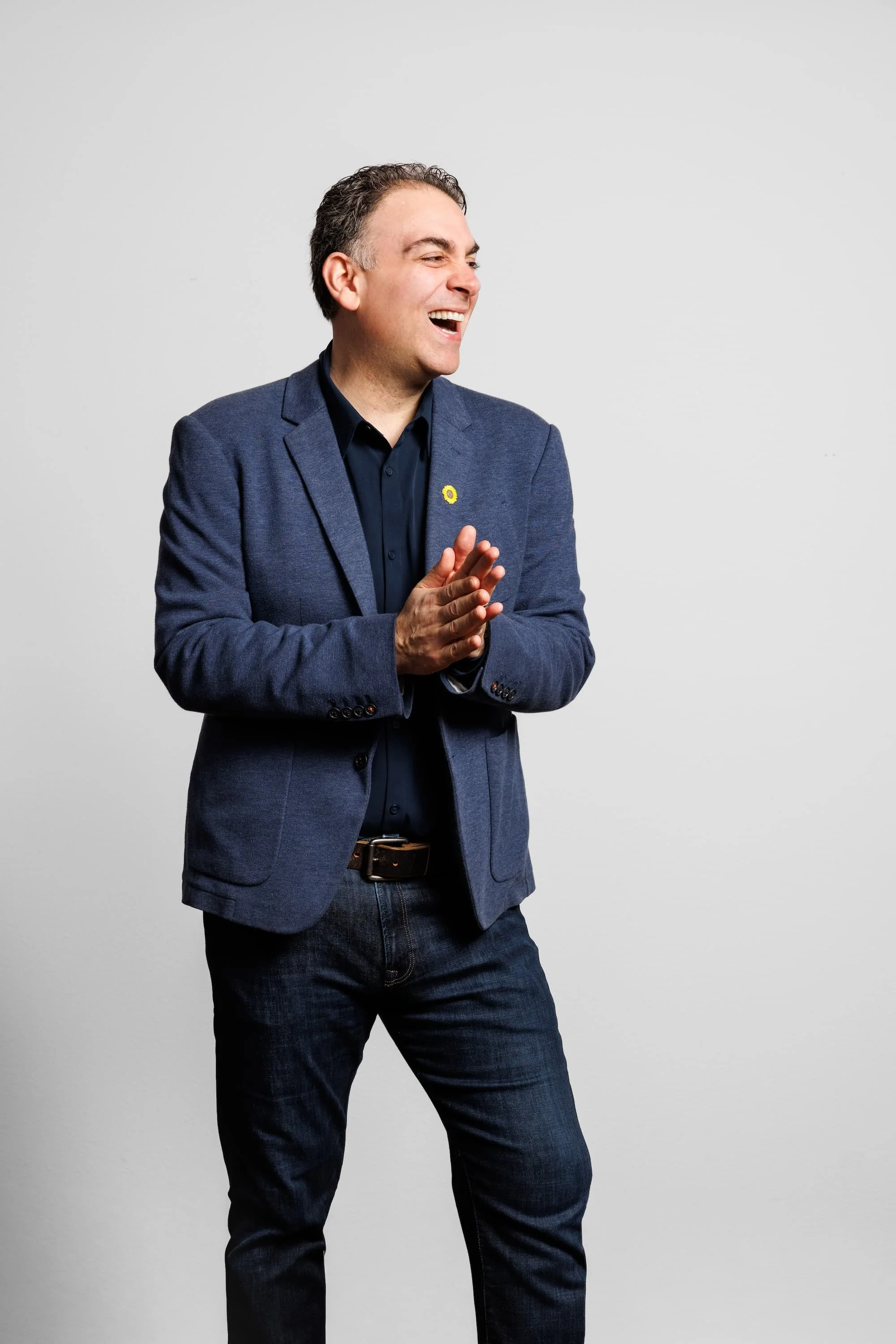 Mark Mohammadpour delivering a keynote presentation to an engaged corporate audience.