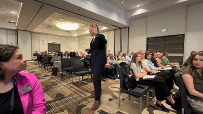 Man walking in audience.
