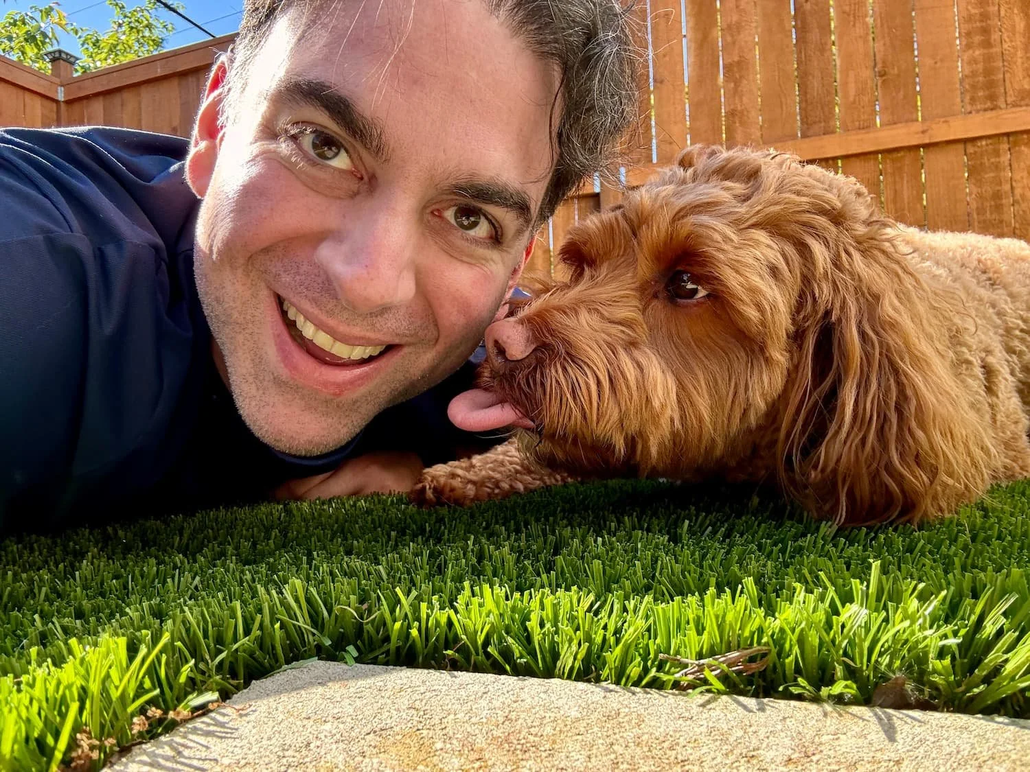 Mark Mohammadpour with his Labradoodle, Molly, who often makes appearances in his keynote presentations.