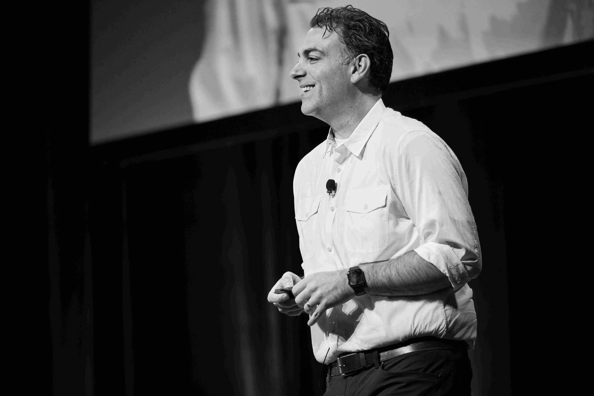 Mark Mohammadpour presenting a keynote to executives
