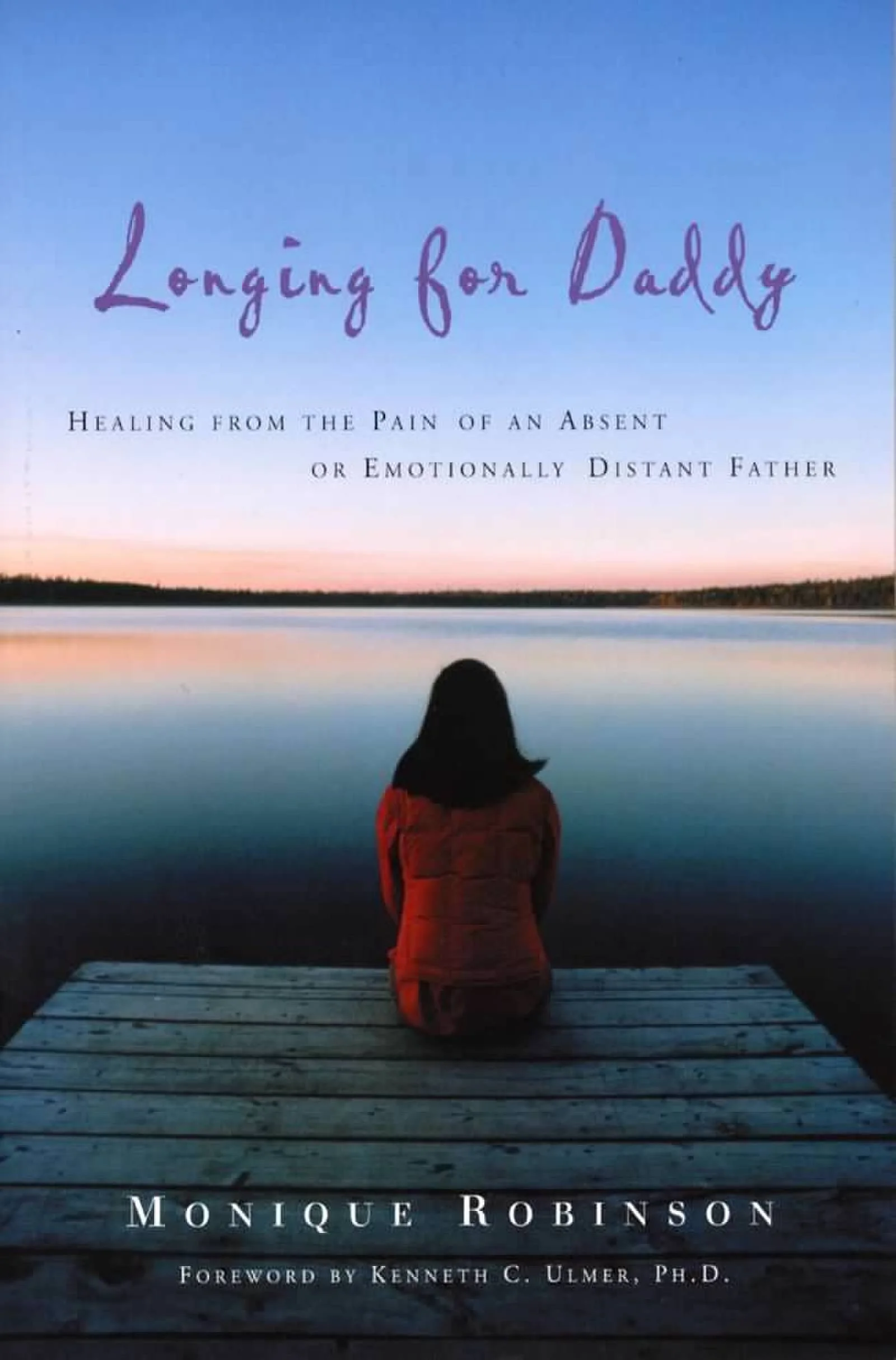 Book cover titled "Longing for Daddy: Healing from the Pain of an Absent or Emotionally Distant Father" by Monique Robinson, featuring a girl sitting on a dock overlooking a calm lake at sunset.
