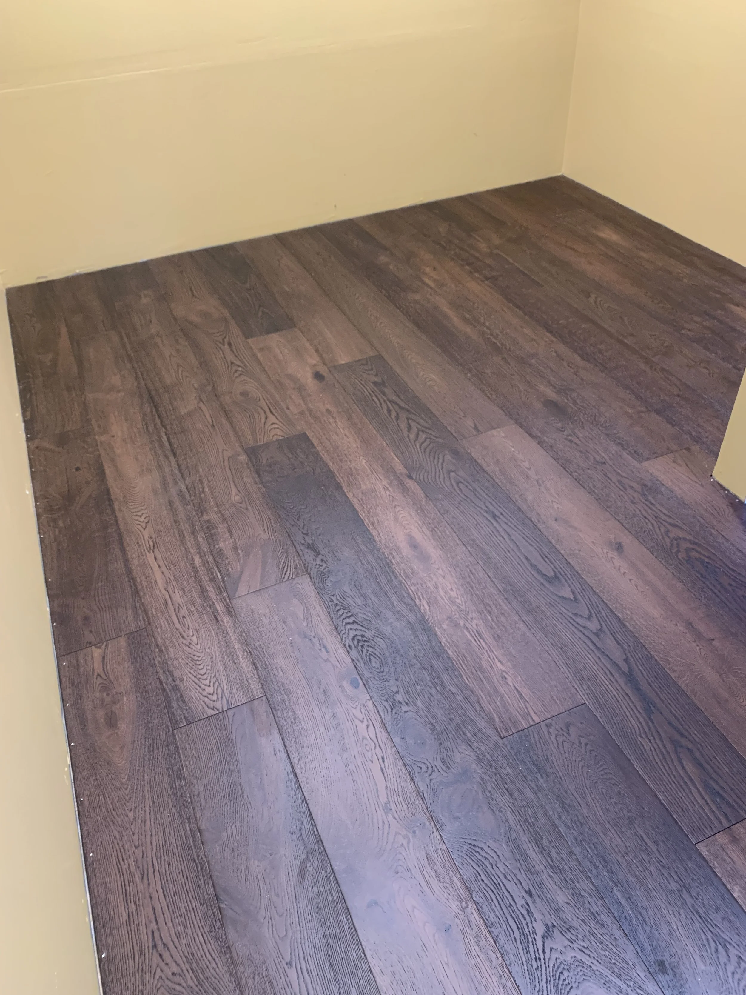 Step 9: Remove all racks and install antique French oak wood flooring.