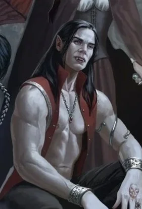 A muscular man with pale skin and long black hair, wearing a red vest and accessorized with jewelry, sitting with a serious expression.
