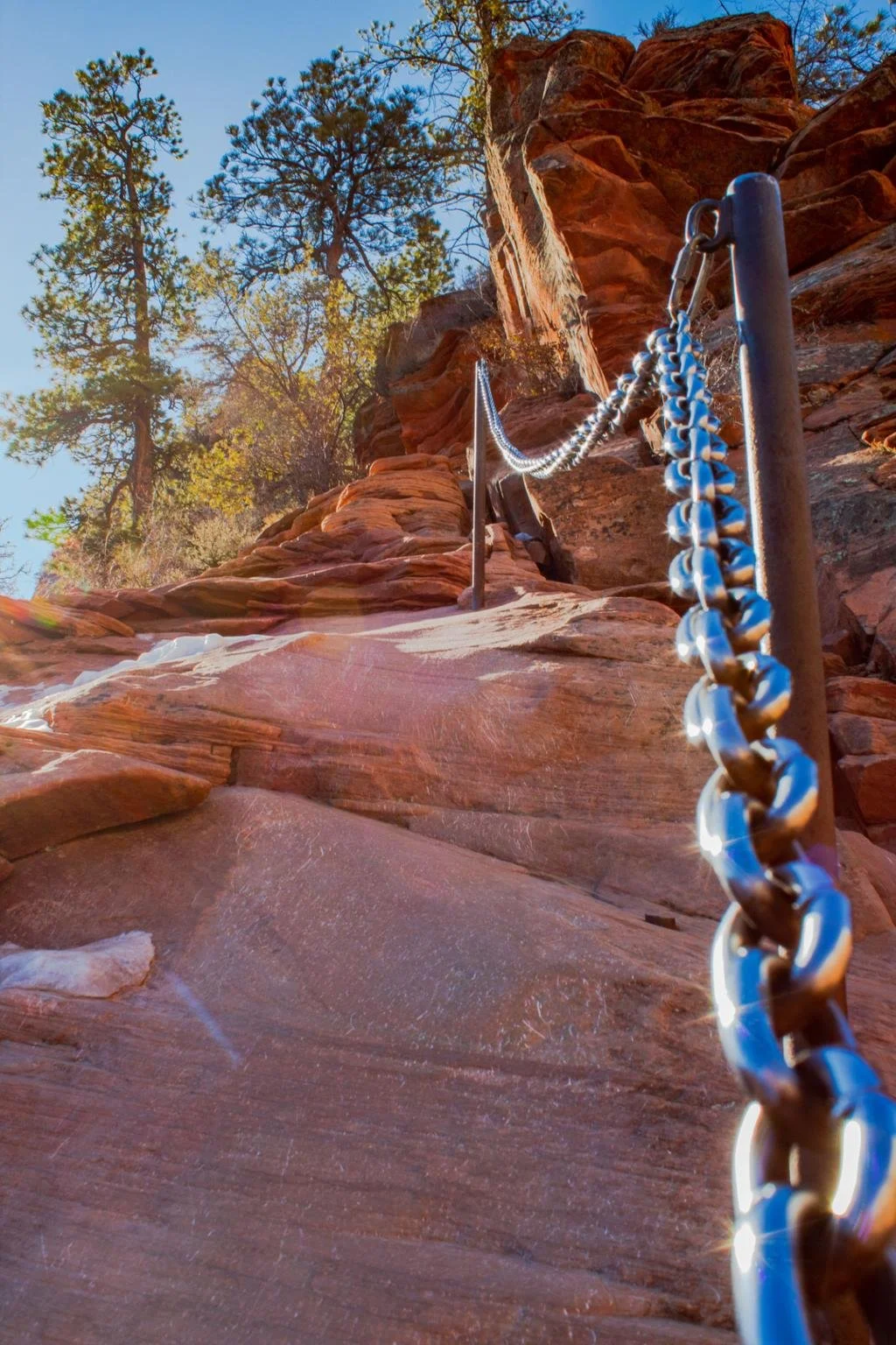 Hikers using chains on Angels Landing trail in Zion National Park Utah