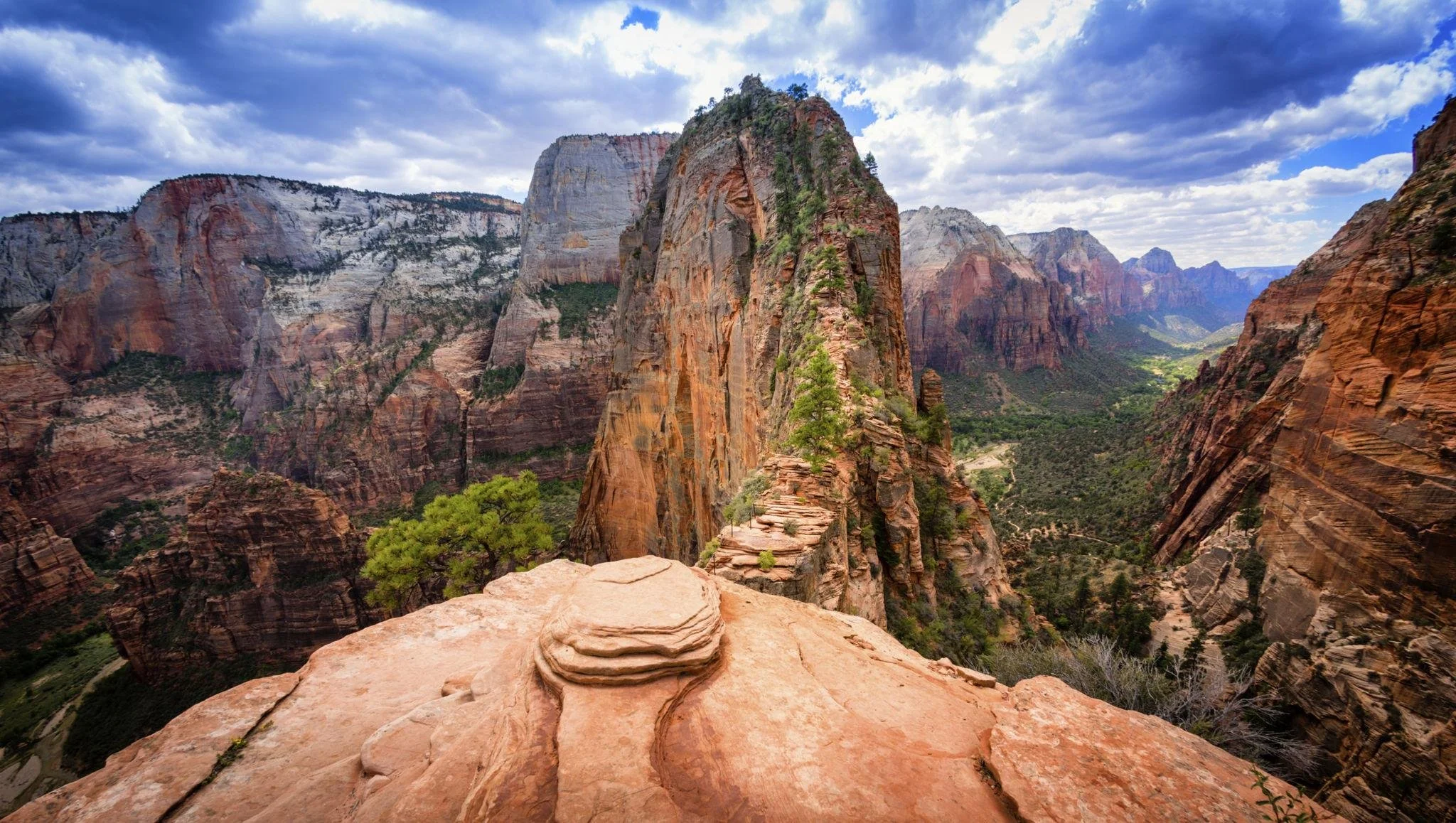 Towering red rock cliffs in Zion Canyon National Park Utah