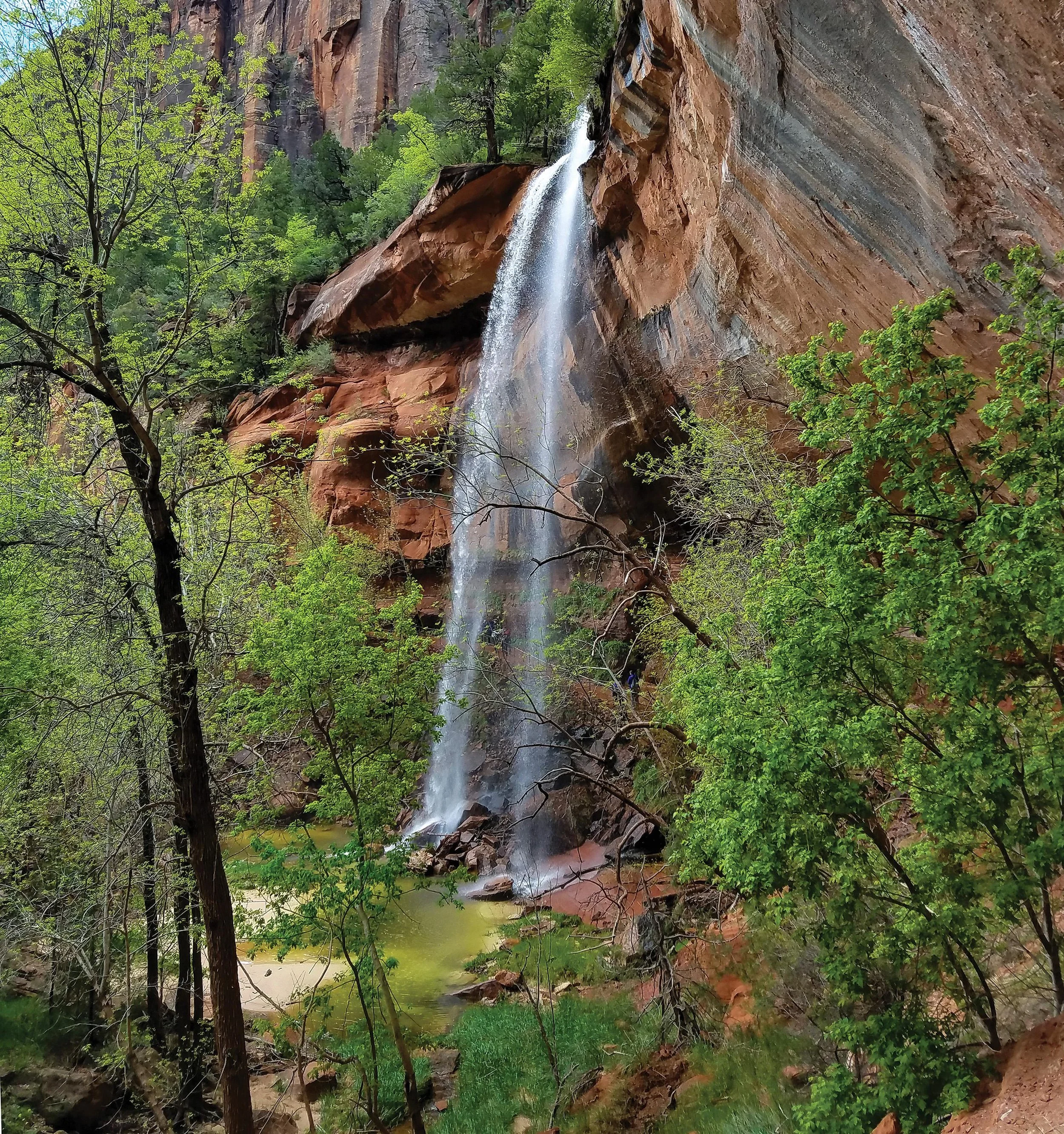 Waterfall at Lower Emerald Pools trail in Zion National Park Utah