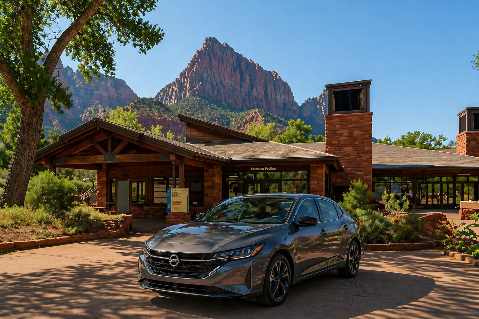 2026 Nissan Sentra rental parked in front of Zion National Park near St. George Utah