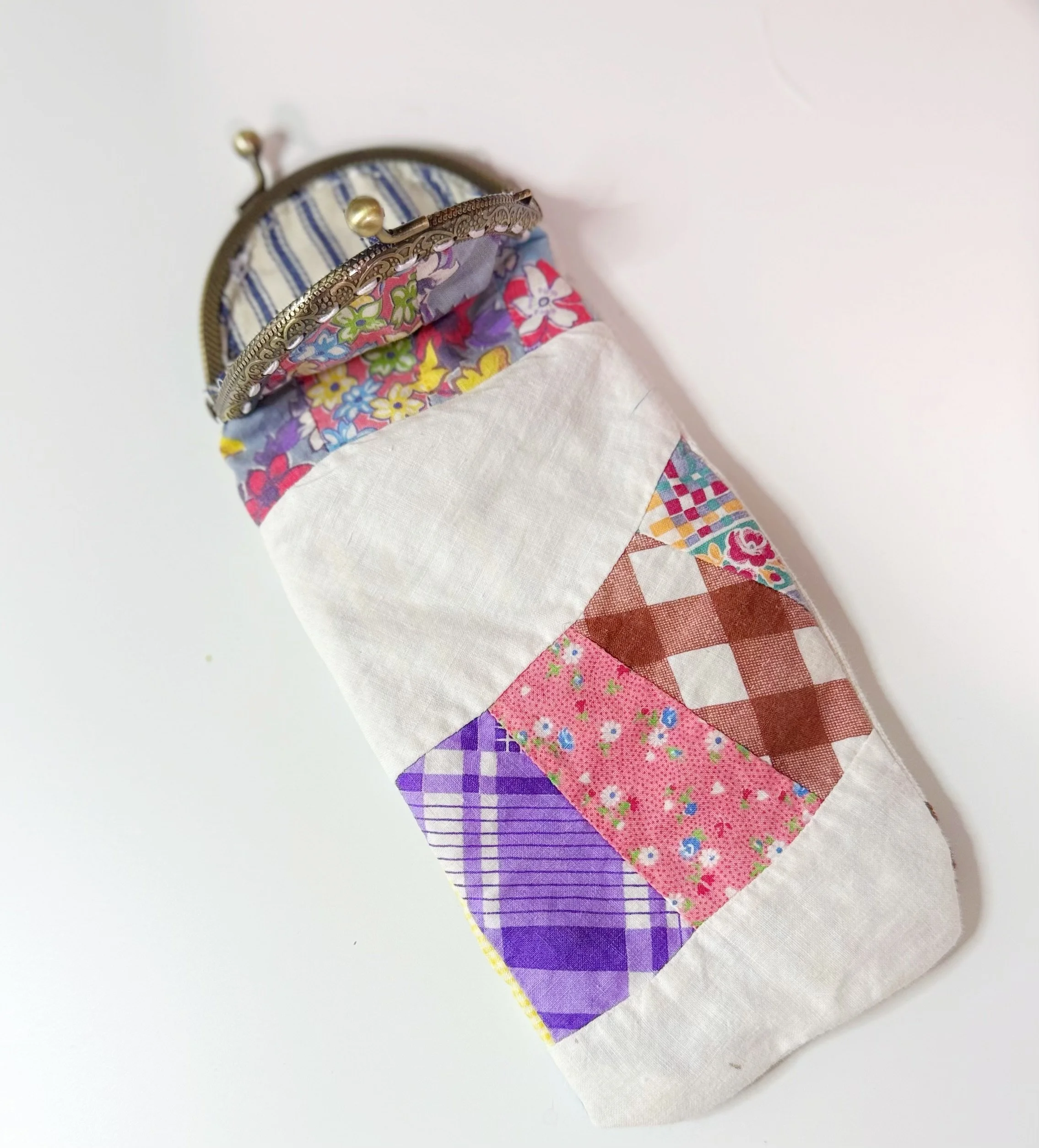 "The Dolly" Hand sewn sunglasses case from antique clasp and 1960s quilt pieces.