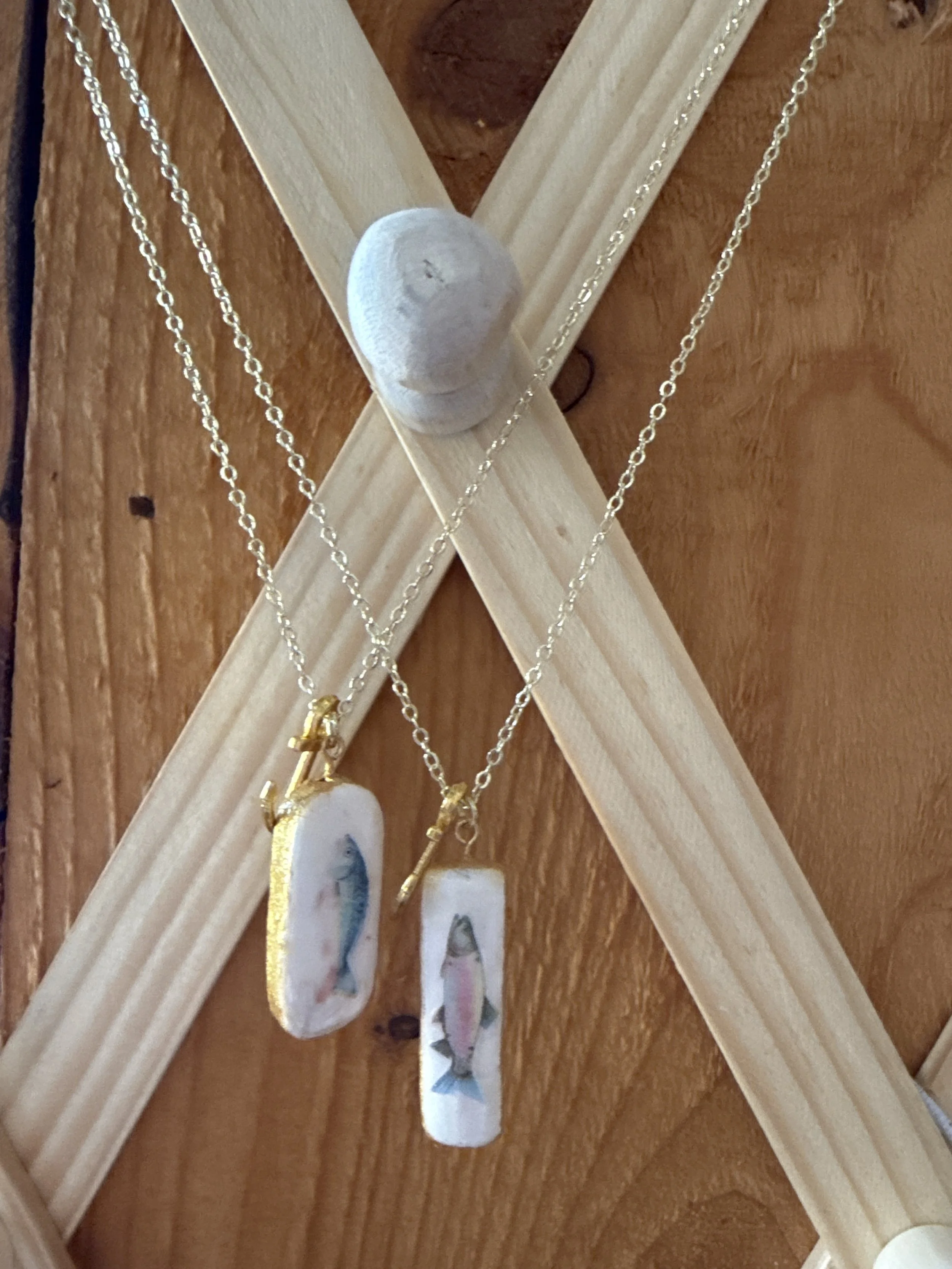 Hand painted porcelain necklaces.