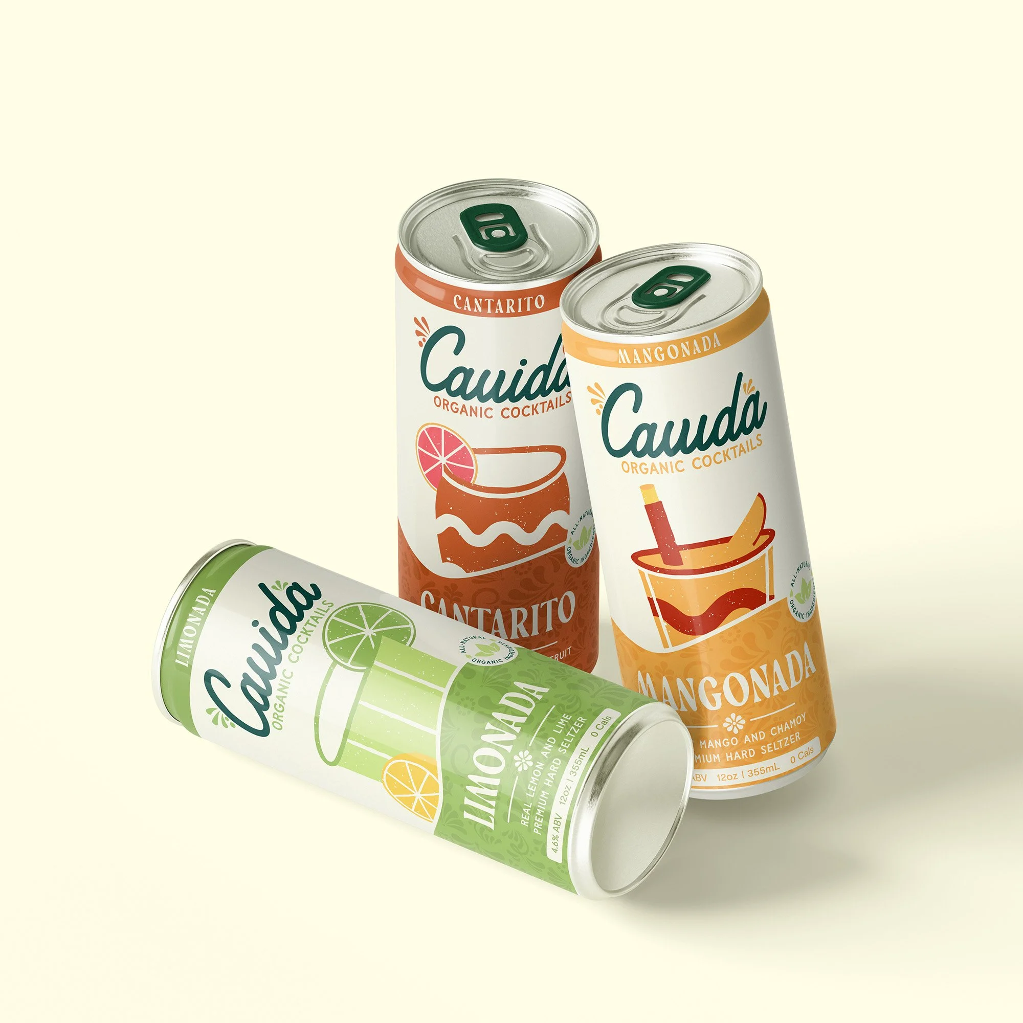 Three cans of Cauda organic cocktails, one limeade, one mangonada, and one cantaro, set against a light background.