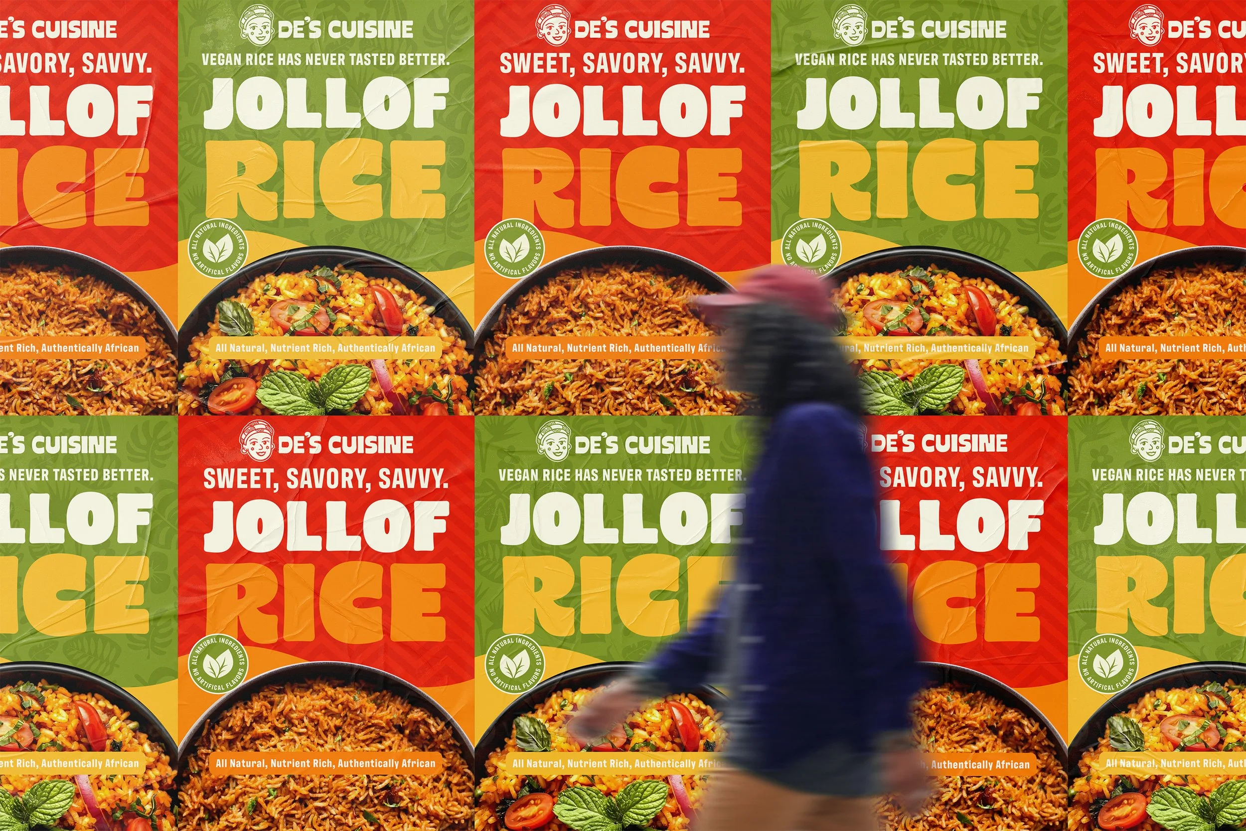 A wall covered with colorful advertisement posters for Jollof rice, showing images of prepared rice dishes with vegetables, and bold text emphasizing that the rice is vegan, nutritious, and African, with a blurred person walking in front.