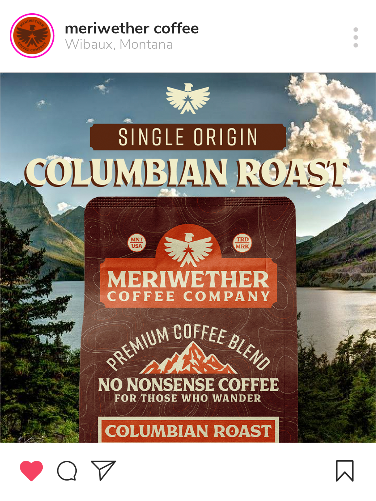 Package of Meriwether Coffee Company's Columbian Roast with a scenic mountain and lake background.