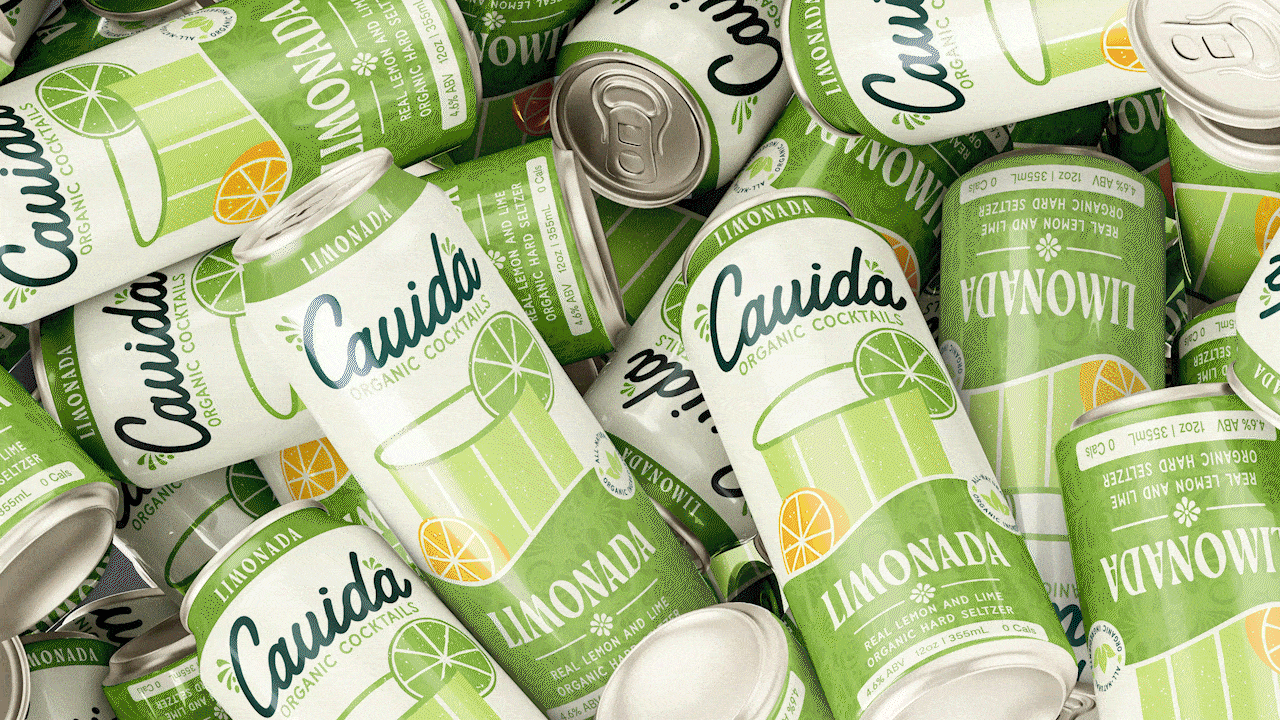A pile of cans of Cuida organic lemon and lime cocktail with a green and white design, showing a lime and lemon illustration on the labels.