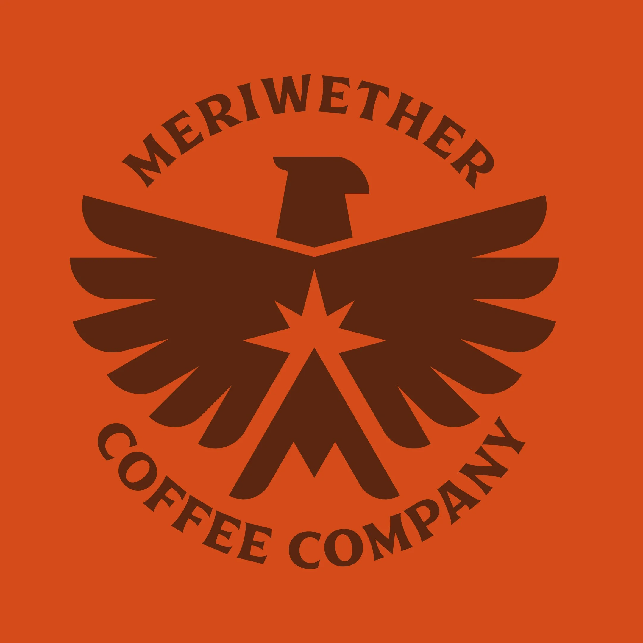 Logo of the Meriwether Coffee Company featuring a stylized eagle with outstretched wings and an eagle head, set against an orange background.