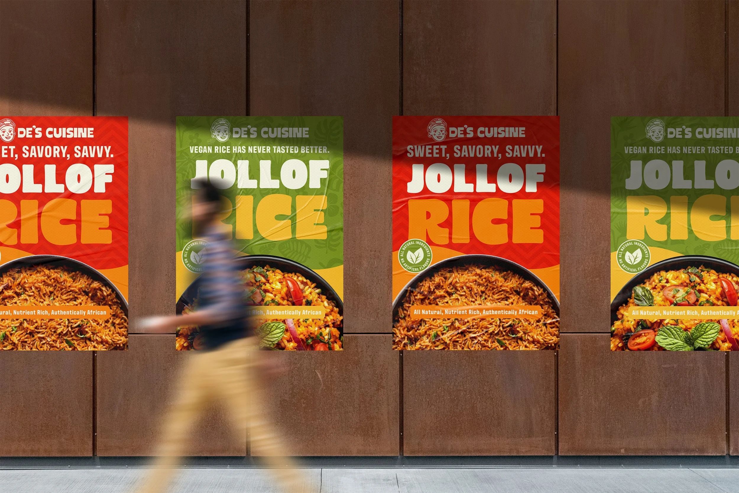 A person walking past large colorful advertisements for Jollof rice, featuring images of rice dishes with vegetables and spices, with the person appearing blurred.