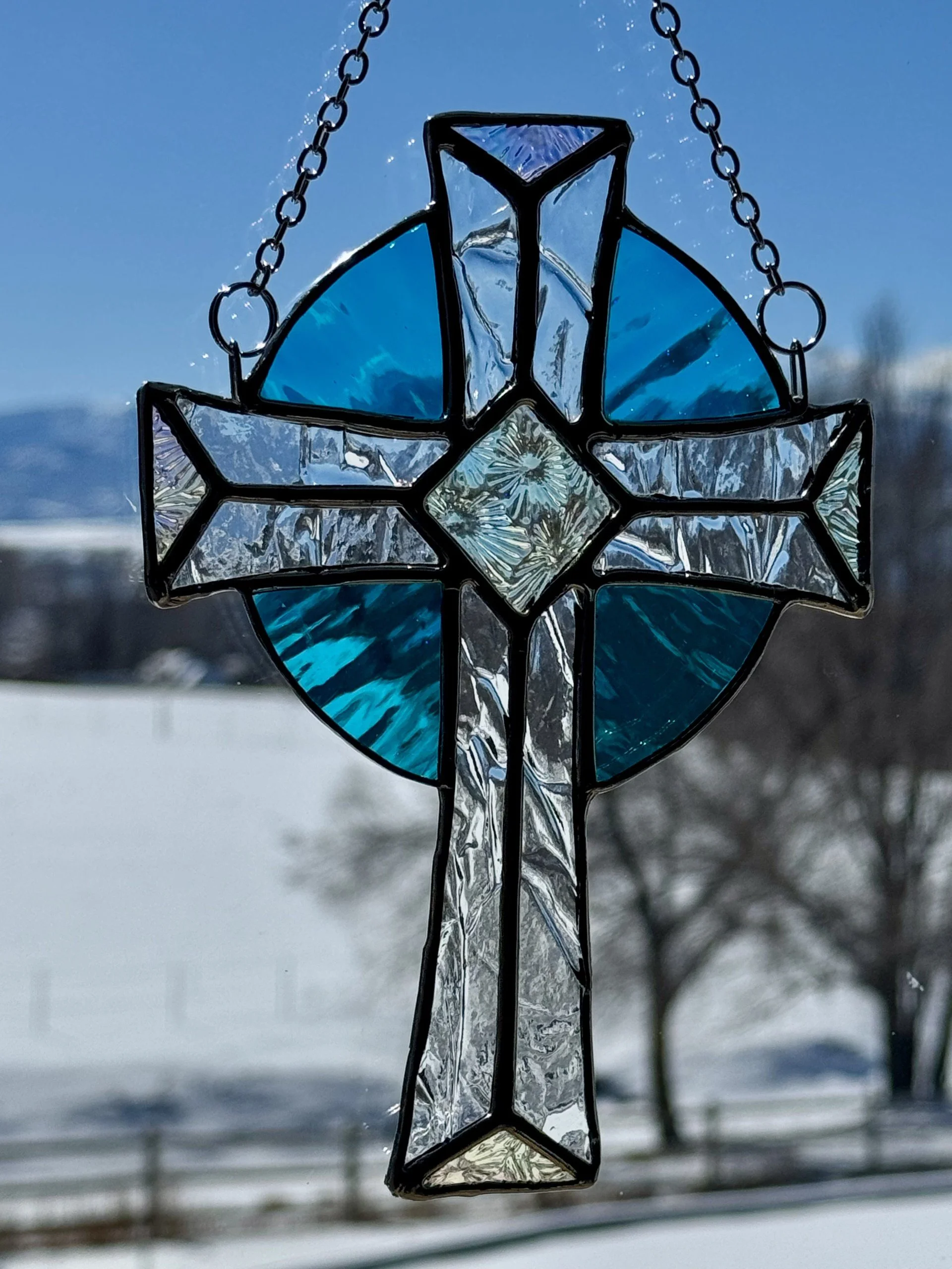 Elegant Light Blue Cross