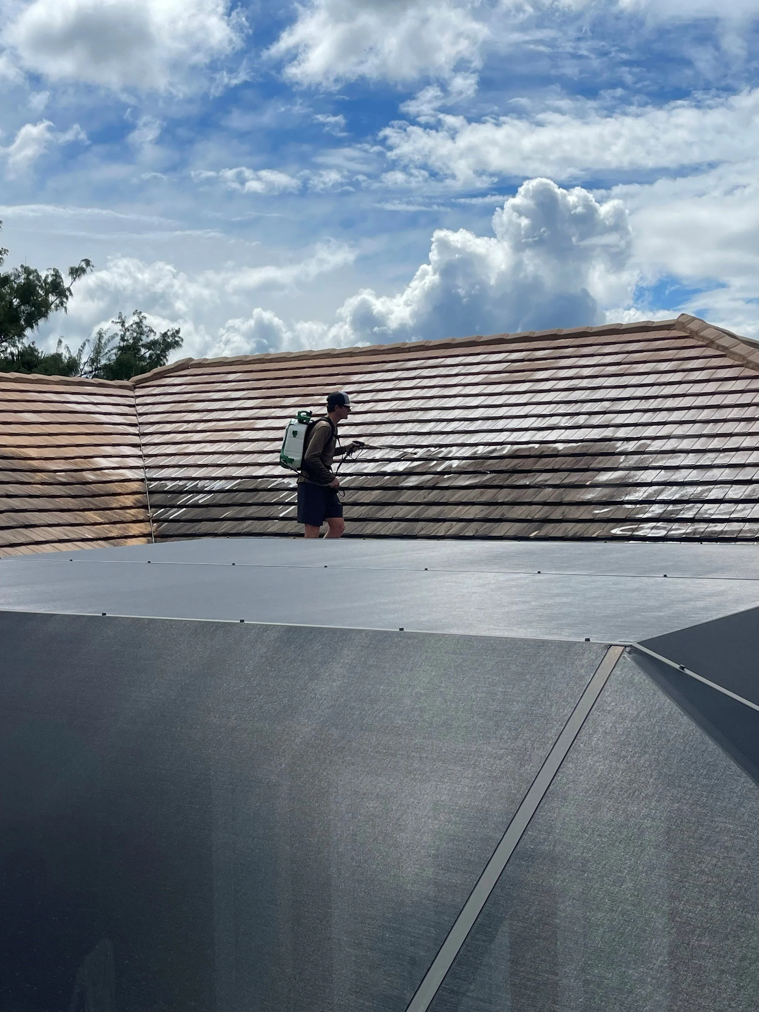 Don't forget the roofs! You may not look up too often with this bright florida sun, but lots of people driving by or flying above, see it. Let's get it all cleaned up for you, and watch how it transforms the look of your home!