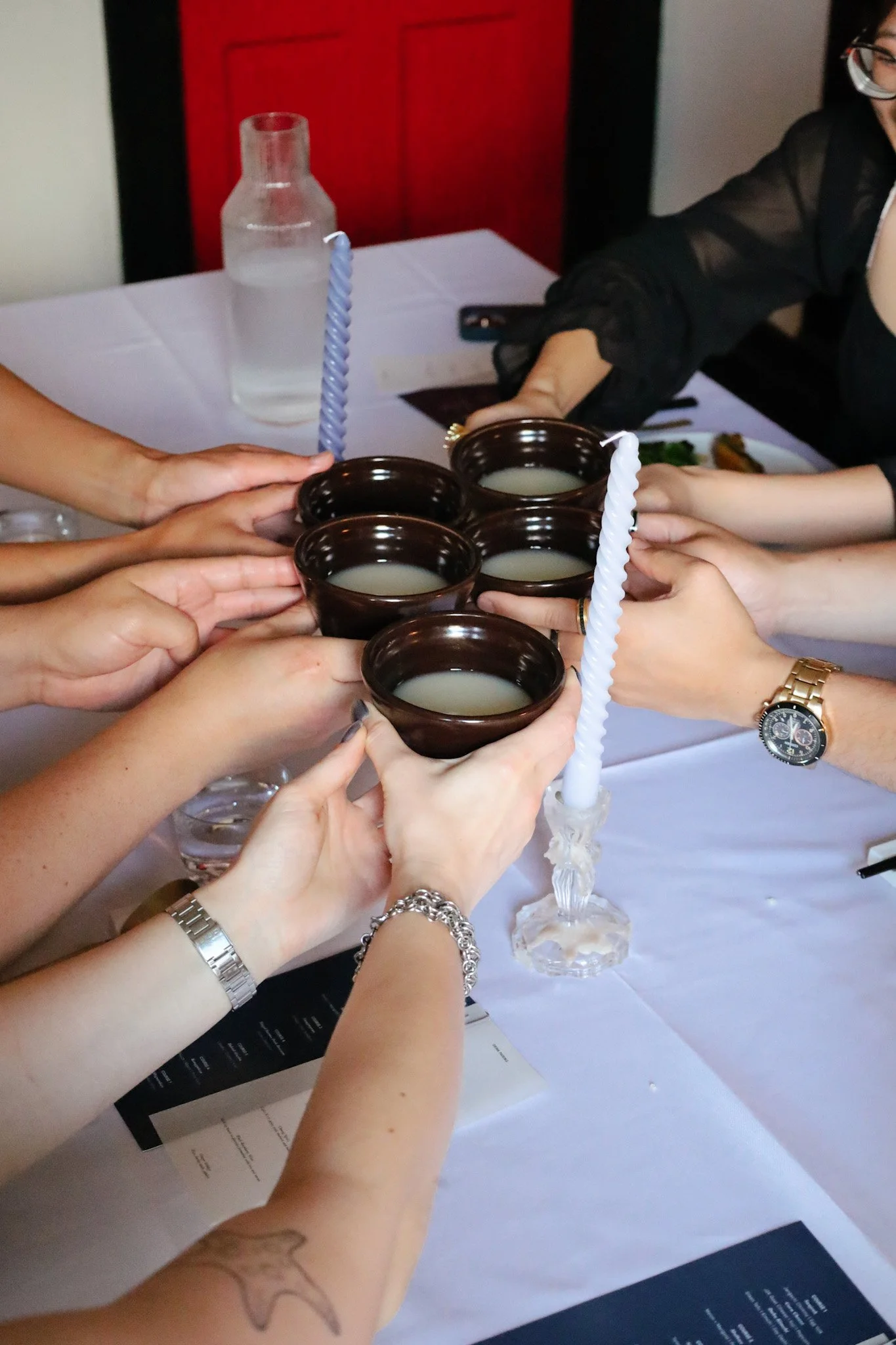ceramic makgeolli cups clinking