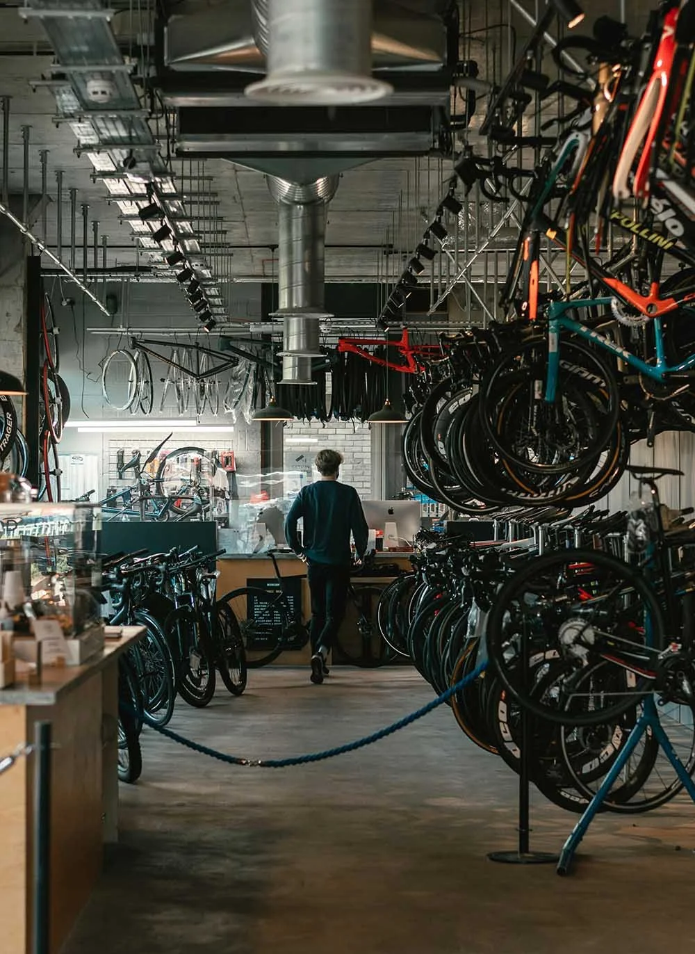 man in a bike shop
