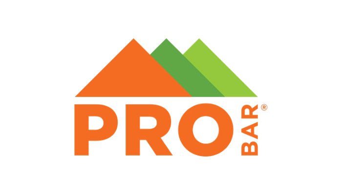 Logo for PRO BAR featuring stylized mountain peaks in orange and green with the text 'PRO BAR' beneath.