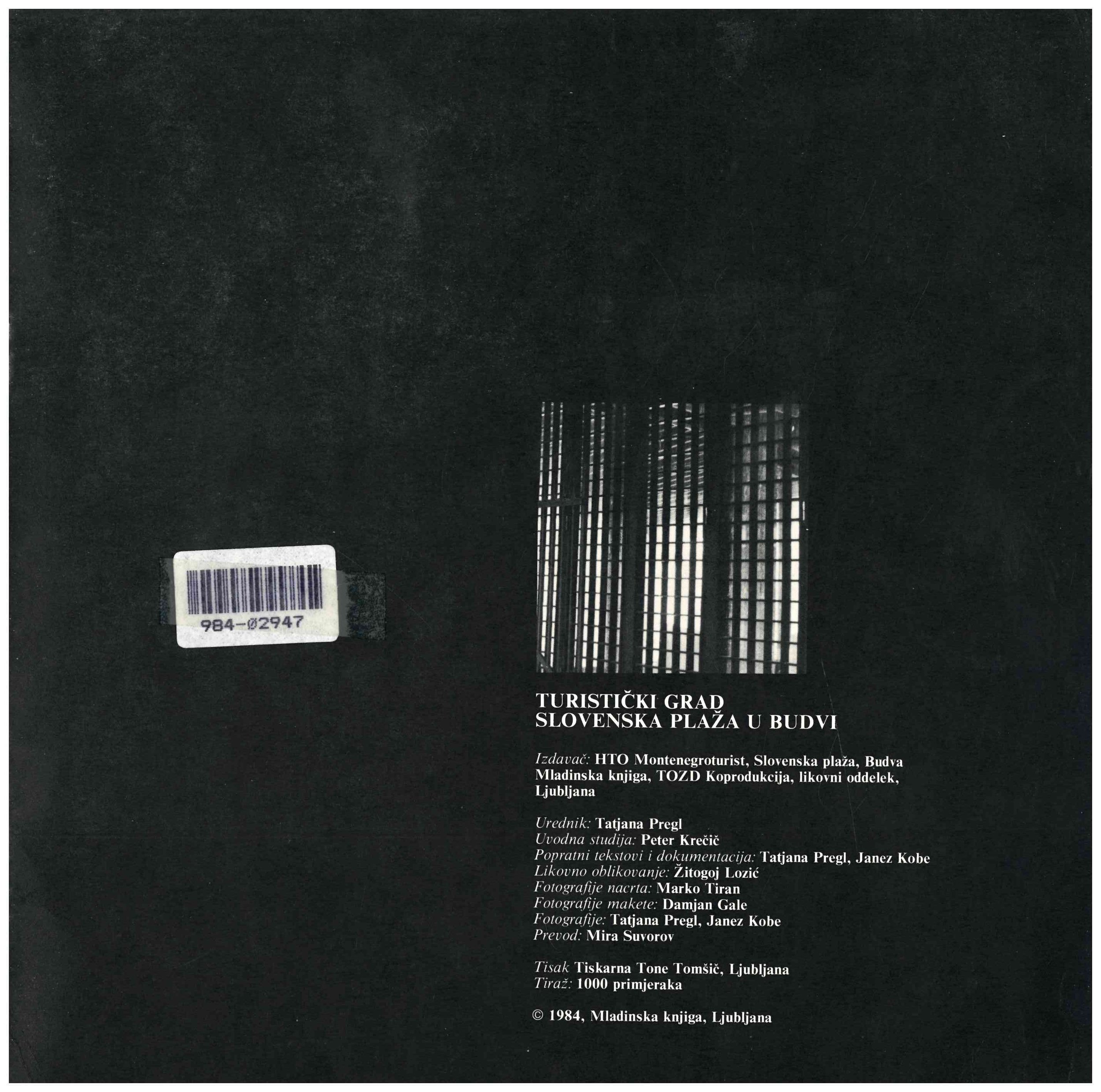 Cover of a book titled 'Tourist City: Slovenian Beach in Building.' The cover is black with a barcode and a window with bars casting shadows. The text is in Slovenian.