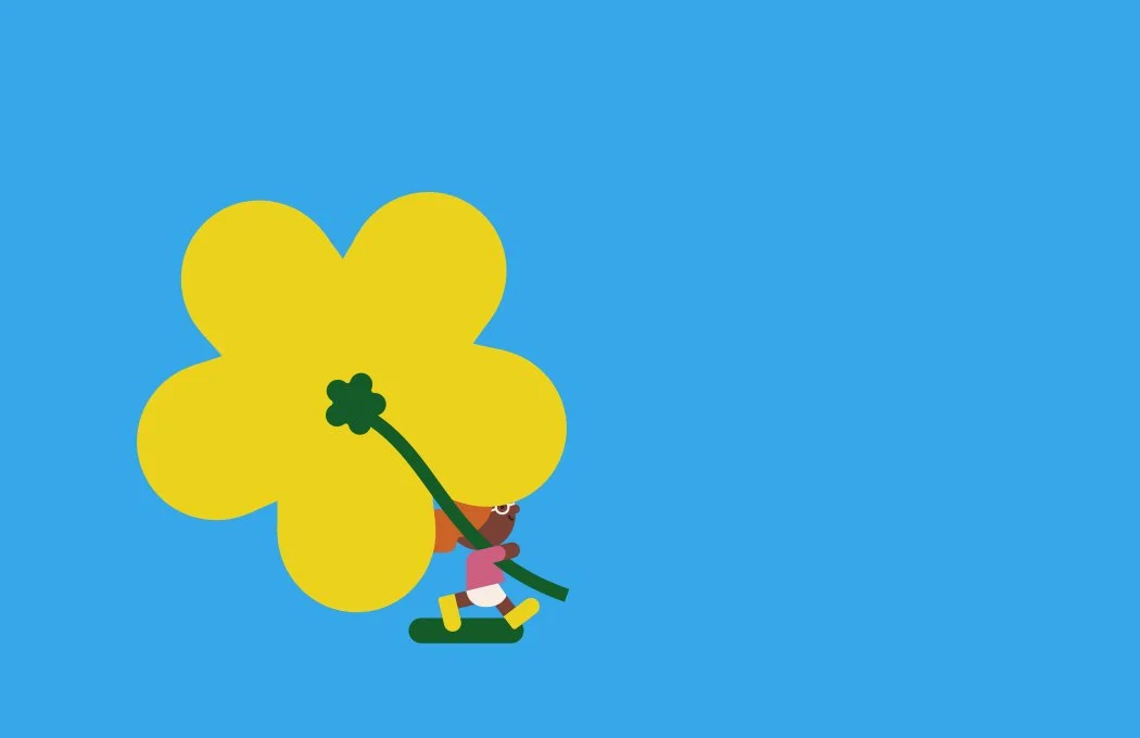 An illustrated kid wearing a pink shirt, white shorts, and yellow shoes is carrying a large yellow four-leaf flower against a blue background.