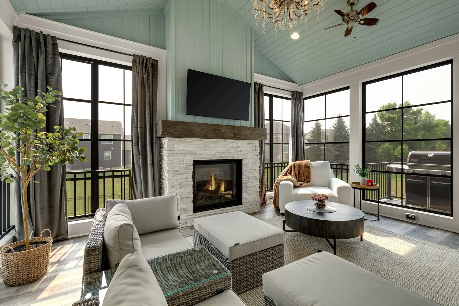 Elegant Screen Porch with Fireplace &amp; Low-Maintenance Finishes | Plymouth, MN