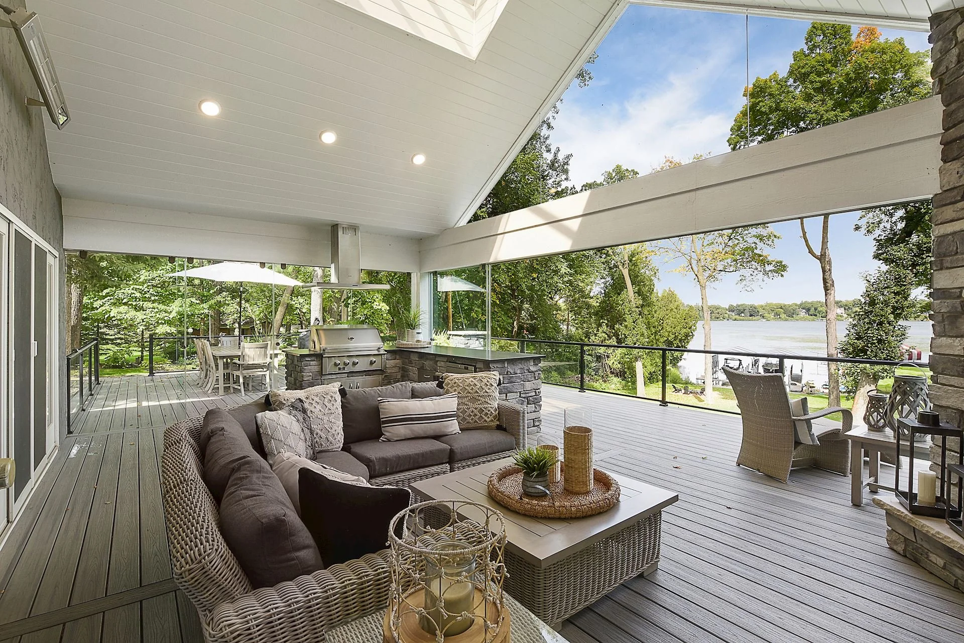 Luxury Three-Season Porch &amp; Deck with Sliding Glass Walls and Lake Views | Orono, MN