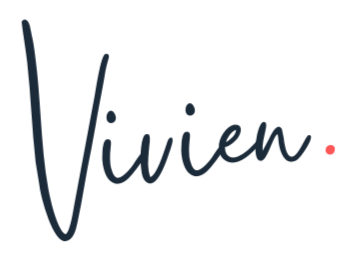 Vivien's signature in dark blue cursive text and a small red dot.