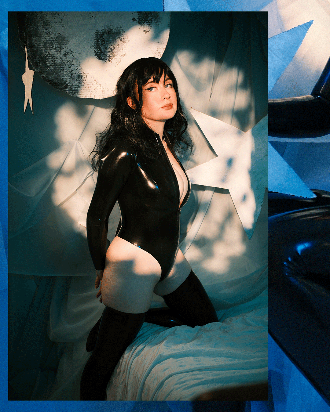 MarieOnCamera-BlackLatexBodysuit-Space-BlackWig-Carousel_01.gif