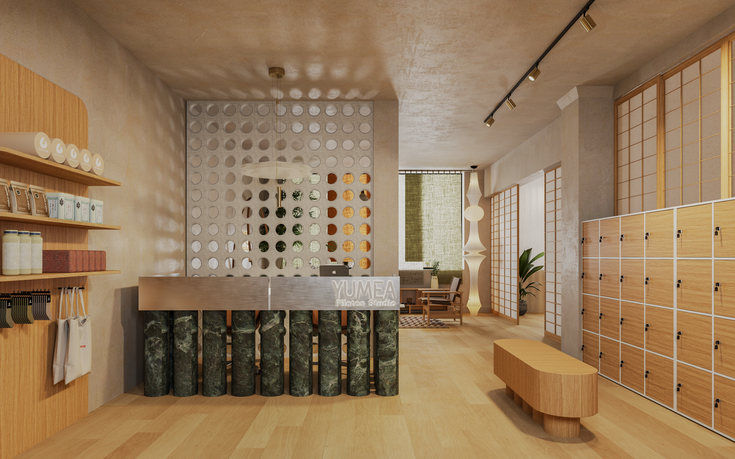 Banque d'accueil en marbre vert pour le studio Pilates et Yoga, design neuro-architecture accueillant. Green marble reception desk for the Pilates and Yoga Studio, featuring welcoming neuro-architecture design.