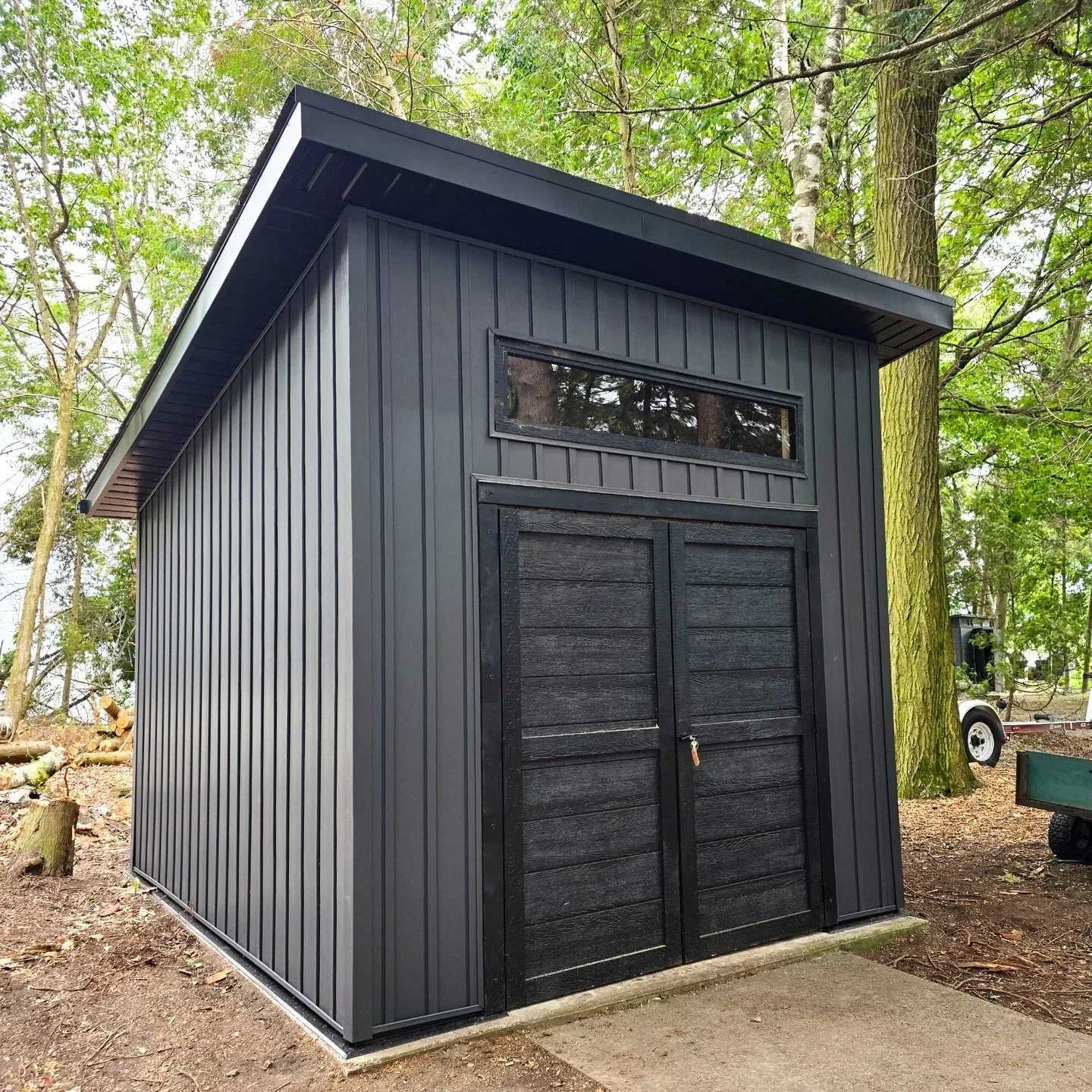 Custom modern slope shed built in Muskoka