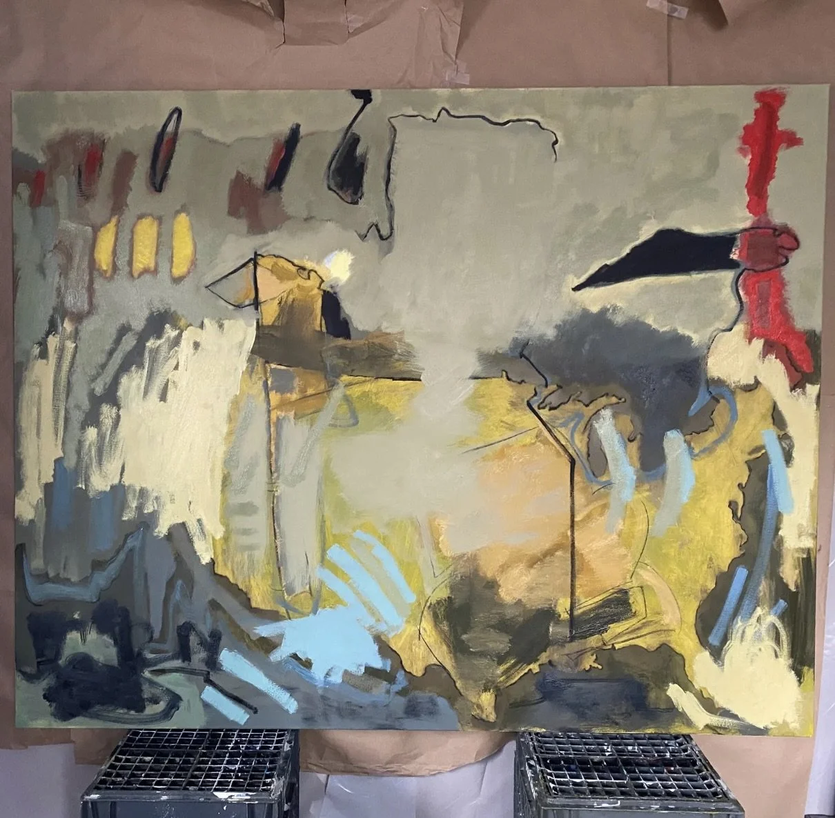 Abstract painting with shades of gray, yellow, black, red, beige, and blue. It features irregular shapes, brushstrokes, and lines, with some areas resembling landscapes or figures.