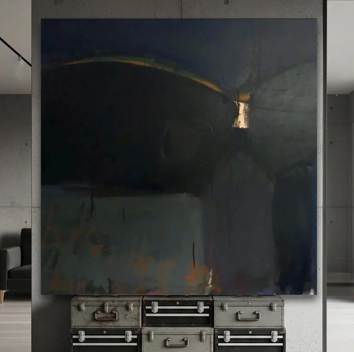 Large abstract painting with dark, muted colors hung on a concrete wall in a modern, minimalist room.