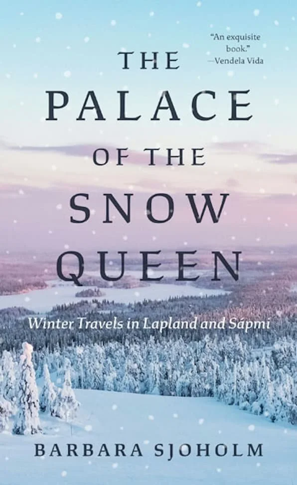 Book cover titled 'The Palace of the Snow Queen: Winter Travels in Lapland and Sapmi' by Barbara Sjoholm. The background depicts a snowy winter landscape with a forest of snow-covered trees under a sky with falling snow.