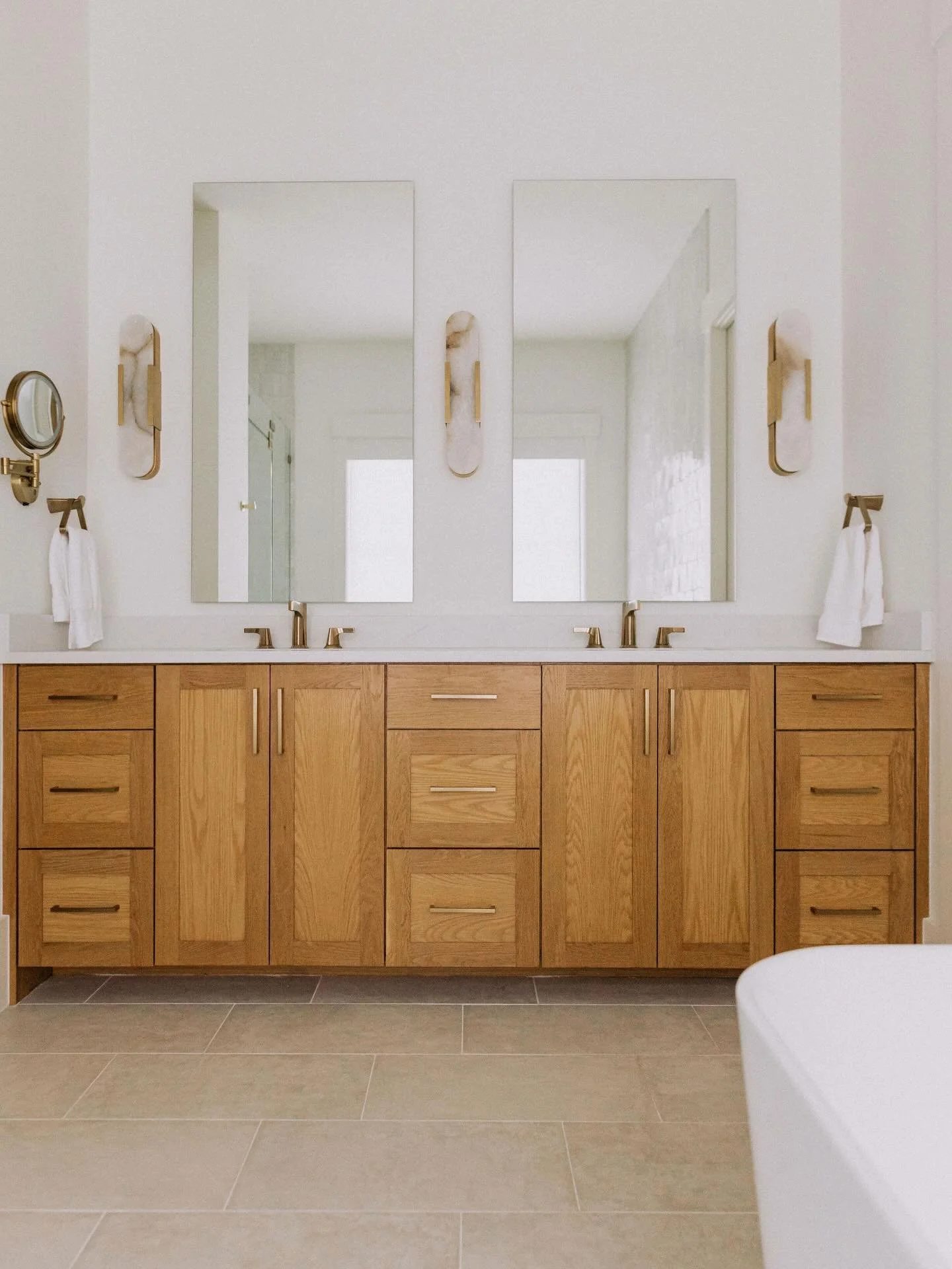 If you&rsquo;re not sure where to start with a bathroom, we keep coming back to this one!!✨

The warmth of the cabinetry against the softer tones.
The way the tile adds just enough texture without feeling busy.
And how everything feels calm, but stil