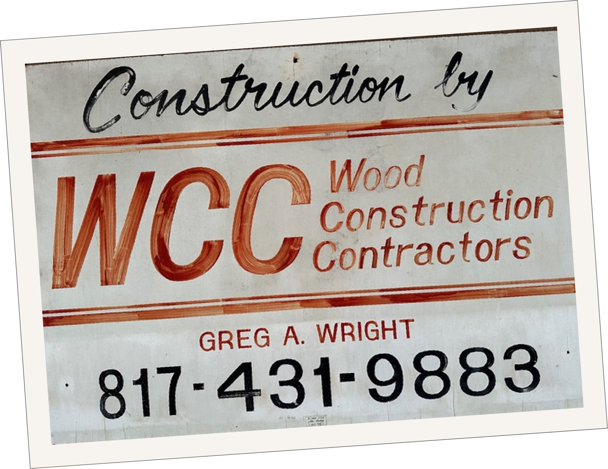 An old sign for Wood Construction Contractors WCC with the name Greg A. Wright and phone number 817-431-9883.